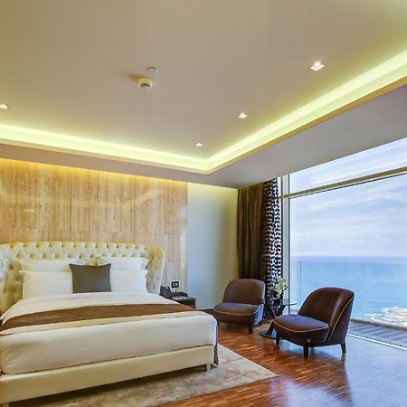 Hotel Lancaster Plaza Beyrouth Extérieur photo A bedroom at the hotel
